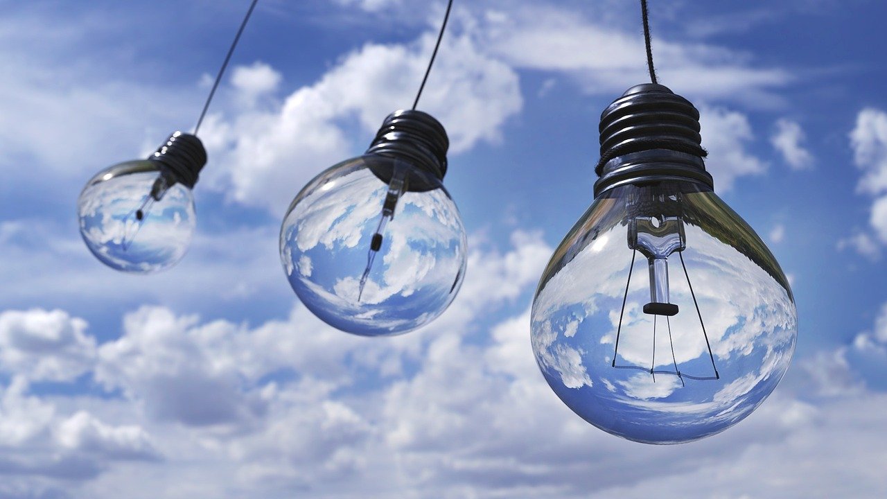 Light bulds on a blue sky background