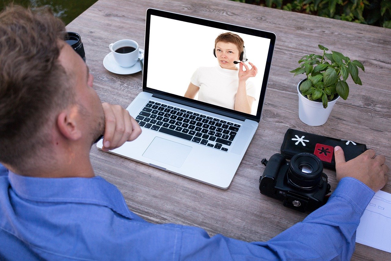 Man having a video call in the computer